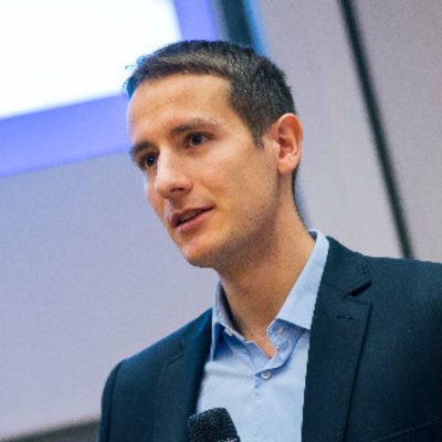 Frederik F. Flöther speaking at BioTechX EU 2023